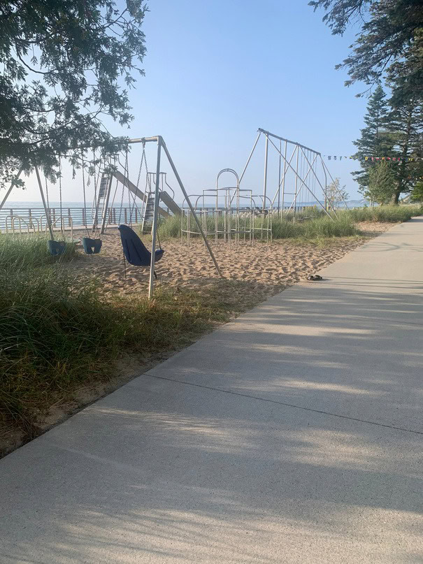 Camp Arcadia swing set by the lake